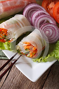 Vegetable spring rolls with sauce vertical top view