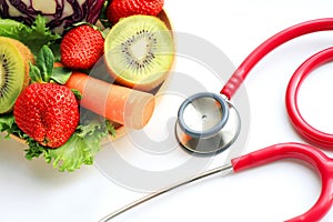 Vegetable and stethoscope, Healthy food and cholesterol diet.