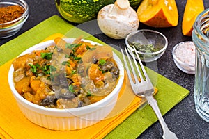 Vegetable stew with pumpkin and champignons