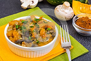 Vegetable stew with pumpkin and champignons