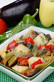 Vegetable stew in white bowl