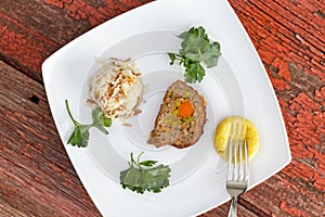 Vegetable Stuffed Meatloaf Served with Rice Pilaf