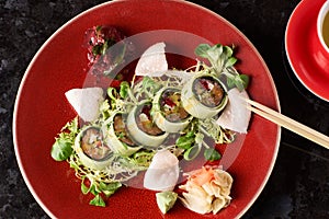 Vegetable sushi rolls with fish