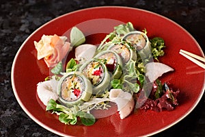 Vegetable sushi rolls with fish