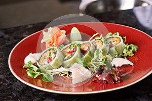 Vegetable sushi rolls with fish