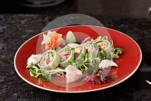 Vegetable sushi rolls with fish