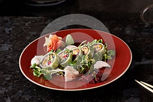 Vegetable sushi rolls with fish