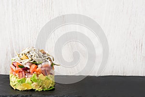 Vegetables and baby eel or elvers tartar