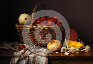 Vegetables in a basket on a dark background