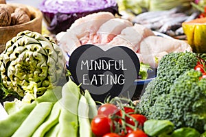 Vegetables, chicken and text mindful eating