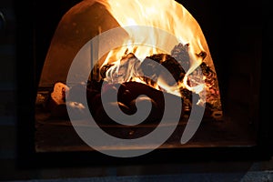 Vegetables cooking in a woodfired oven