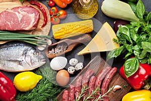 Vegetables, fish, meat and ingredients cooking