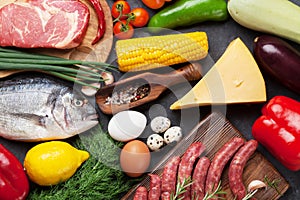 Vegetables, fish, meat and ingredients cooking