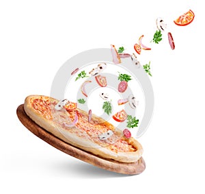 Vegetables fly to pizza on a white background