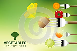 Vegetables on forks isolated on natural background , healthy food concept