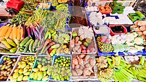 vegetables and fruit at a stall at a traditional market