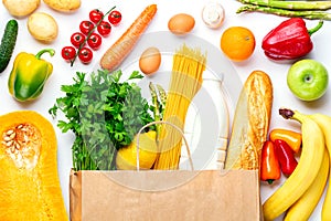 Vegetables, fruits assortment with shopping bag and bottle of milk on white background. Vegetarian healthy food concept. Food and