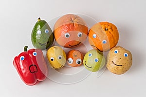 Vegetables and fruits characters with Googly eyes and funny faces. Proper nutrition concept