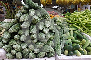 Vegetables and fruits on display in grocery store