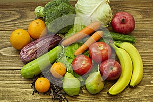 Vegetables and fruits on wooden table. healthy diet