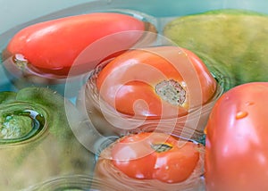 Vegetables in green bowl. Tomatoes, Chayot, Ingredients,  Salad. photo