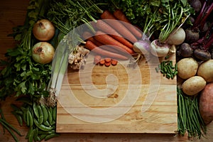 Vegetables, kitchen and empty cutting board for healthy food, cooking and preperation on table above. Culinary, organic