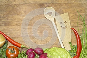 Vegetables and kitchenware on cutting board