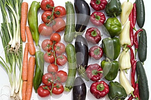 Vegetables lineup on white background