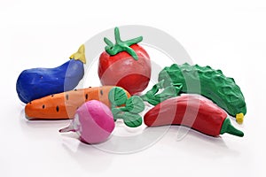 Vegetables made from plasticine. photo