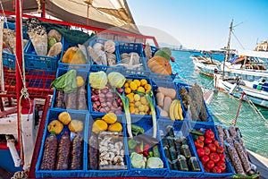 Vegetables at a market stall on a boat in Aegina port in Greece