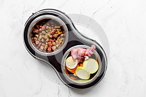 Vegetables and petfood on kitchen table background top view mock up