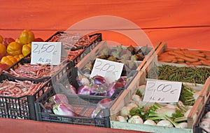 Vegetables with price tags in the street market