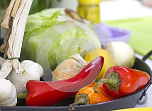 Vegetables - red and yellow sweet bell peppers, garlic, onions,