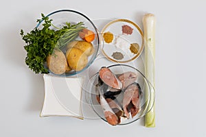 Vegetables and salmon for fish soup. Culinary background with selective focus