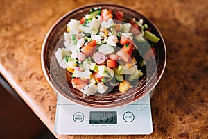 Vegetables on the scales