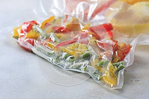 Vegetables in sealed vacuum packing bags. Su-video cooking.