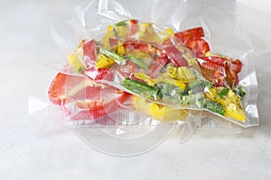 Vegetables in sealed vacuum packing bags. Su-video cooking.