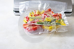 Vegetables in sealed vacuum packing bags. Su-video cooking.