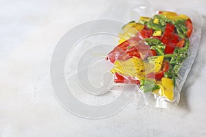 Vegetables in sealed vacuum packing bags. Su-video cooking.