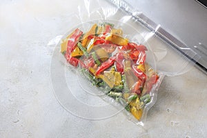 Vegetables in sealed vacuum packing bags. Su-video cooking.