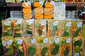 Vegetables sliced and packed in sets for salads for sell in supermarket