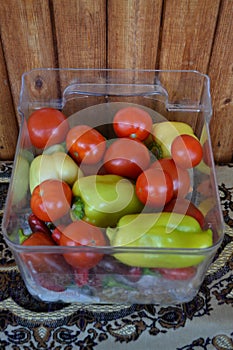Vegetables stilllife tomatoes peppers cucumbers photo
