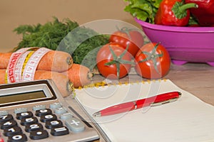 Vegetables, tomato. Measure tape and fresh vegetables in the background. Healthy lifestyle diet with fresh fruits