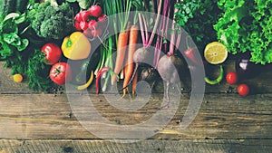 Vegetables on wooden background. Bio healthy organic food, herbs and spices. Raw and vegetarian concept. Ingredients