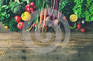 Vegetables on wooden background. Bio healthy organic food, herbs and spices. Raw and vegetarian concept. Ingredients