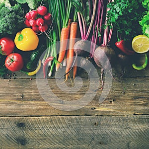 Vegetables on wooden background. Bio healthy organic food, herbs and spices. Raw and vegetarian concept. Ingredients