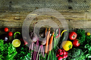 Vegetables on wooden background. Bio healthy organic food, herbs and spices. Raw and vegetarian concept. Ingredients