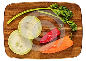 Vegetables on a wooden cutting board