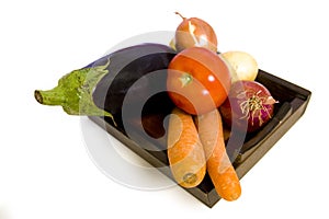 Vegetables on wooden plate