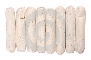 Vegetarian barbecue sausages, in a row, from above, isolated, over white
